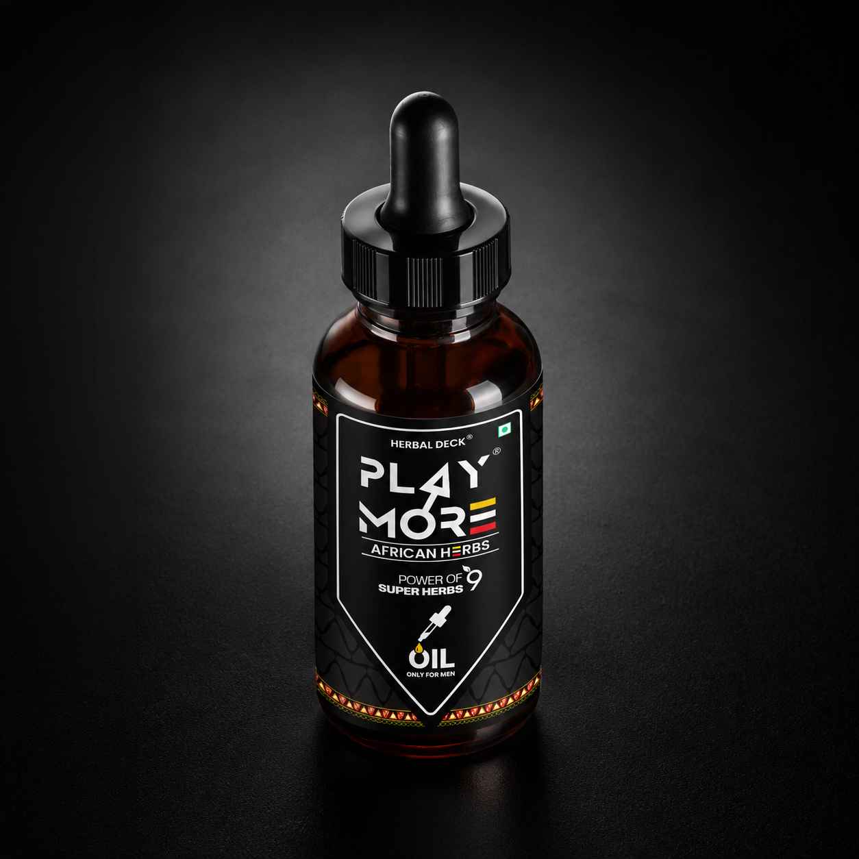 Play More Ayurvedic oil in a dark premium studio setting